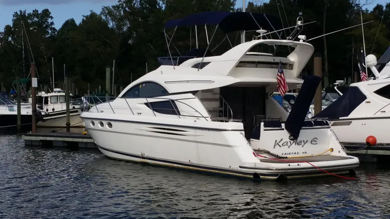 Slide: The Image of 2006 Fairline Phantom yacht docked at marina. - 12