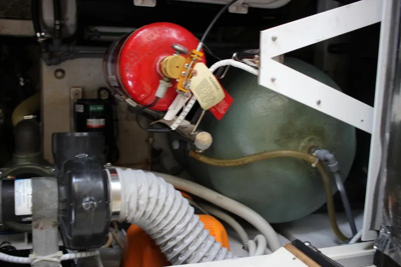 Slide: The Image of Engine room of a 2006 Fairline Phantom yacht with mechanical components. - 20