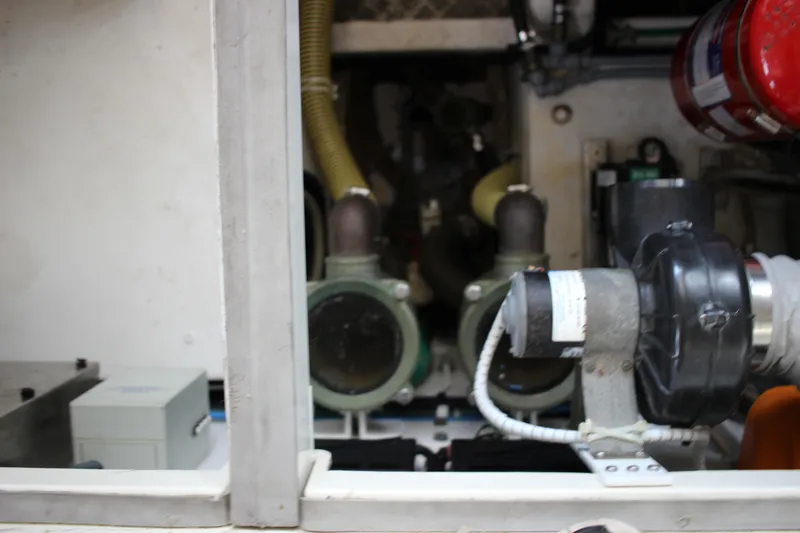 Slide: The Image of Engine room of a 2006 Fairline Phantom yacht showing mechanical components. - 21