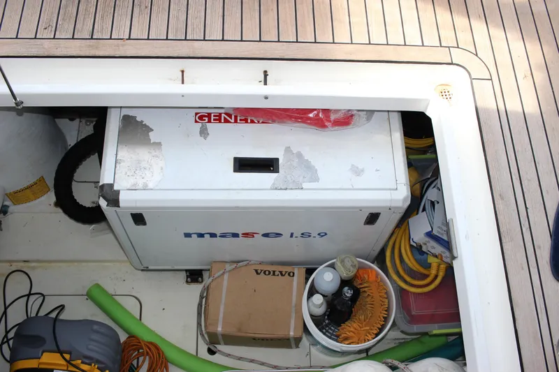 Slide: The Image of Fairline Phantom 2006 engine compartment with Mase IS.9 generator and various equipment. - 28