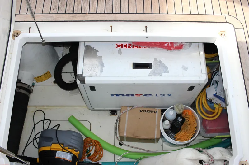 Slide: The Image of 2006 Fairline Phantom engine compartment with generator and various equipment. - 29