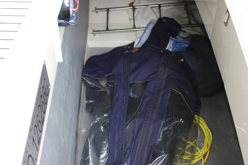 Slide: The Image of Storage compartment on a 2006 Fairline Phantom boat with gear and equipment. - 33