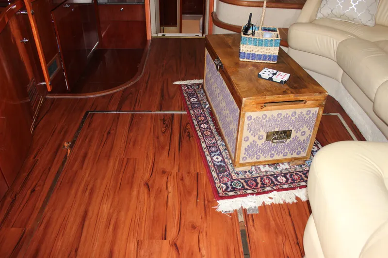 Slide: The Image of Luxurious 2006 Fairline Phantom yacht interior with wooden flooring and elegant furnishings. - 39
