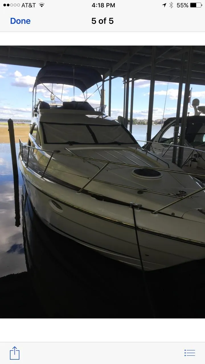 Slide: The Image of 2006 Fairline Phantom yacht docked in a marina. - 8