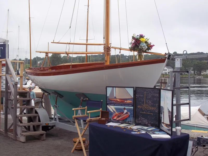 Slide: The Image of Herreshoff Fish Class sailboat on display with informational booth, 2011 model. - 4