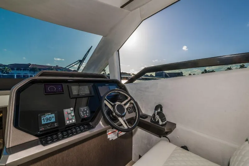 Slide: The Image of Cockpit of 2023 Galeon 500 Fly yacht with modern navigation equipment. - 24