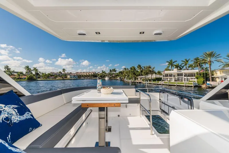 Slide: The Image of Luxury deck view of 2023 Galeon 500 Fly yacht cruising on a sunny day. - 30