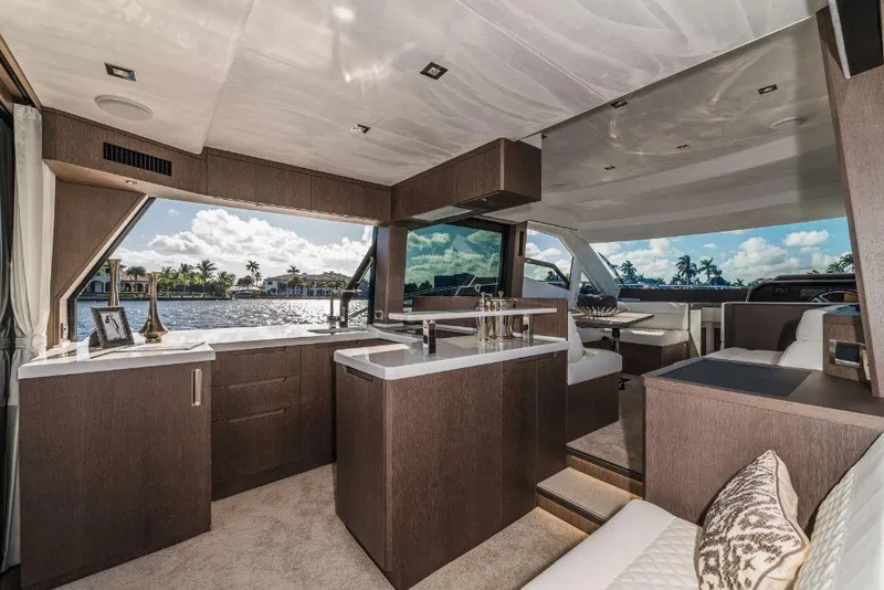 Slide: The Image of Luxurious interior of 2023 Galeon 500 Fly yacht with modern kitchen and scenic water view. - 31