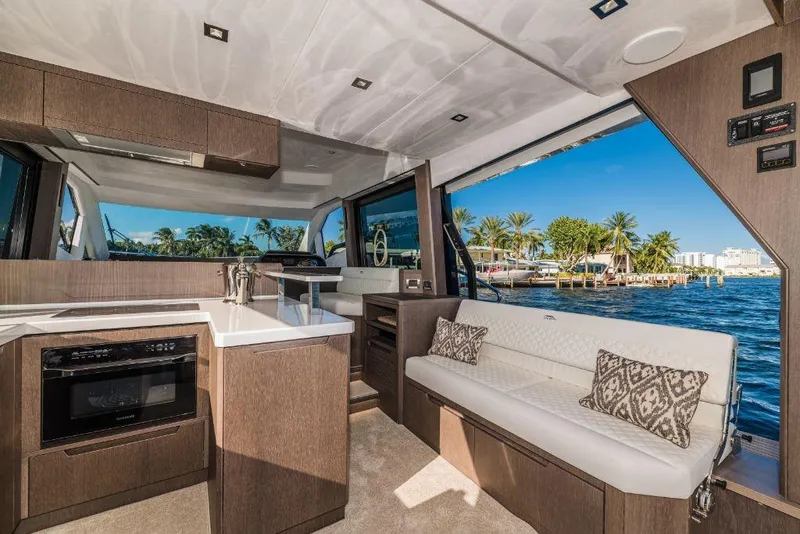 Slide: The Image of Modern interior of 2023 Galeon 500 Fly yacht with waterfront view. - 35