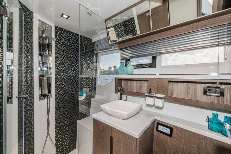 Slide: The Image of Modern bathroom in 2023 Galeon 500 Fly yacht with sleek design and ocean view. - 40