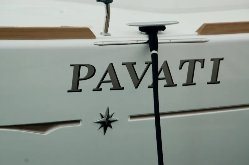 Slide: The Image of Jeanneau Sun Odyssey 33i 2013 sailboat with "PAVATI" name and star emblem. - 18