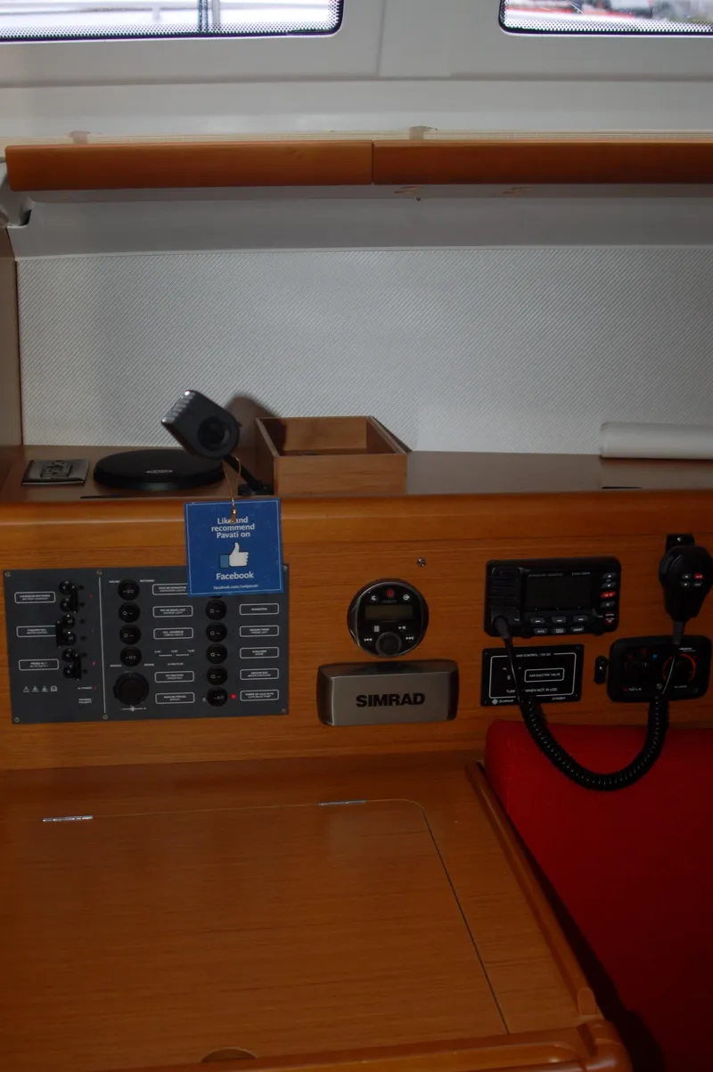 Slide: The Image of Control panel of 2013 Jeanneau Sun Odyssey 33i sailboat with navigation equipment. - 20