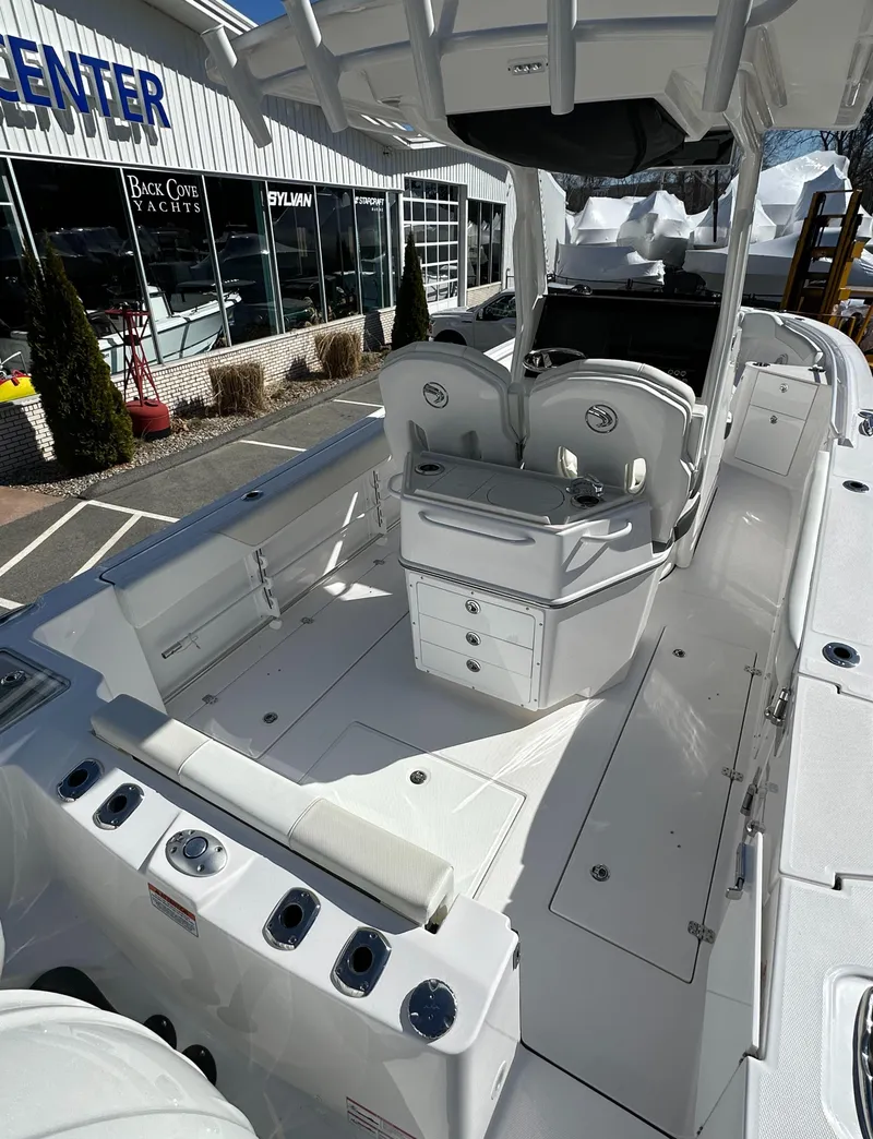 Slide: The Image of 2025 Edgewater 262 Center Console boat with spacious deck and modern seating. - 11
