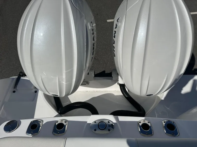 Slide: The Image of 2025 Edgewater 262 Center Console boat with dual outboard engines, top view. - 18