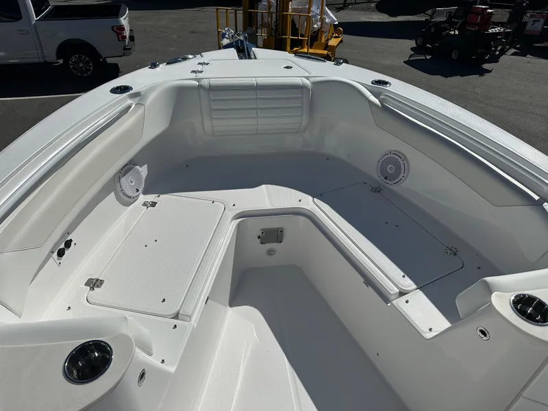 Slide: The Image of 2025 Edgewater 262 Center Console boat interior with seating and storage compartments. - 34