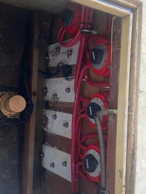 Slide: The Image of Electrical wiring and components inside a 1953 Rybovich Express boat. - 44