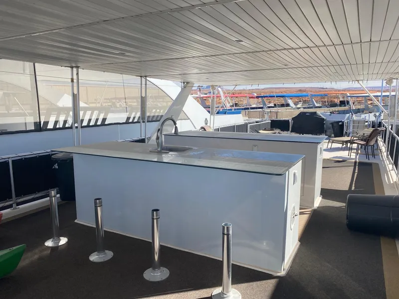 Slide: The Image of Luxurious 2012 Bravada Ho'Okipa yacht deck with modern amenities and shared ownership. - 10