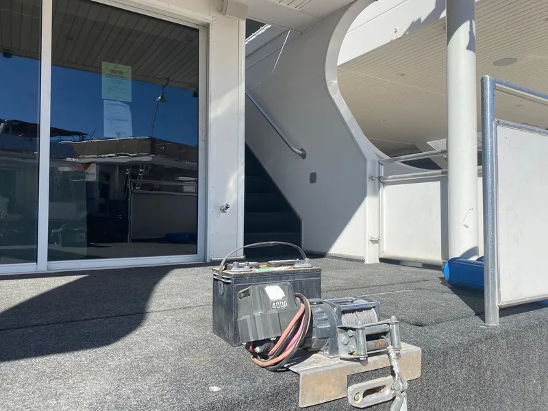 Slide: The Image of 2012 Bravada Ho'Okipa Trip #1 boat entrance with battery and winch on deck. - 4