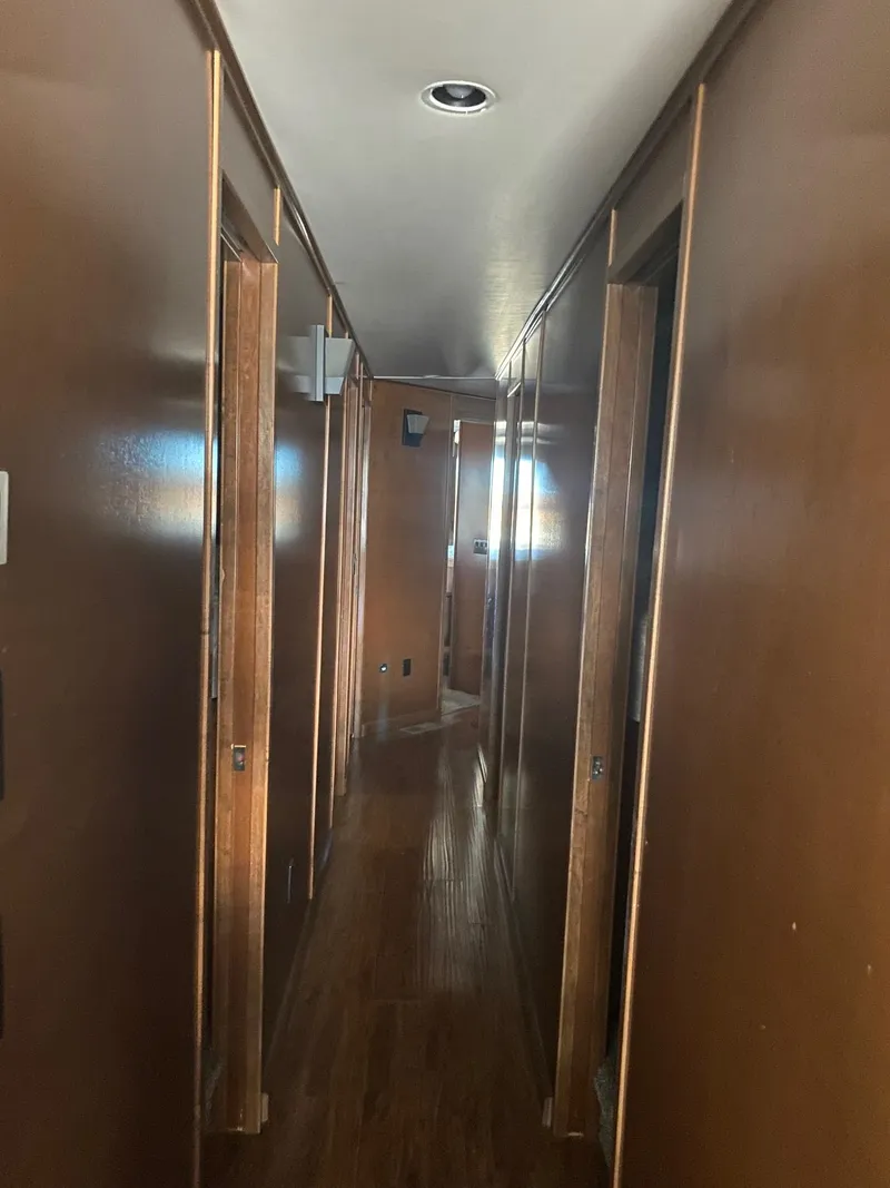 Slide: The Image of Narrow hallway inside 2012 Bravada Ho'Okipa Trip #1 Shared Ownership houseboat. - 6