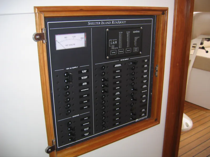 Slide: The Image of Electrical control panel of 2026 CH Marine Shelter Island Runabout boat. - 7