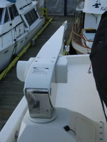 Slide: The Image of 1998 Ocean Alexander Pilothouse Model 584 yacht in a wooden boathouse. - 23