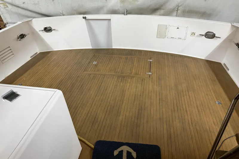 Slide: The Image of Luxurious 1998 Ocean Alexander Pilothouse Model 584 interior with plush seating and elegant decor. - 33