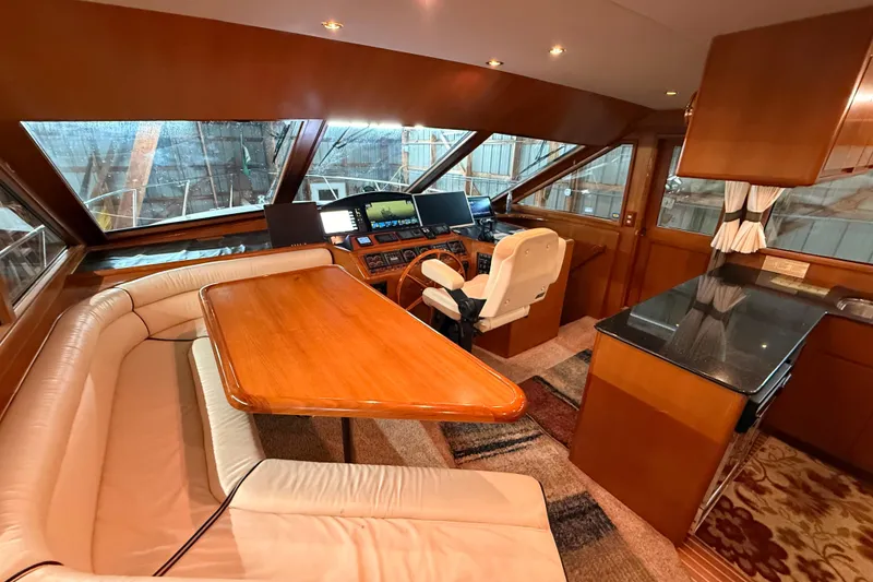 Slide: The Image of Luxurious 1998 Ocean Alexander Pilothouse Model 584 interior with modern kitchen and seating. - 39