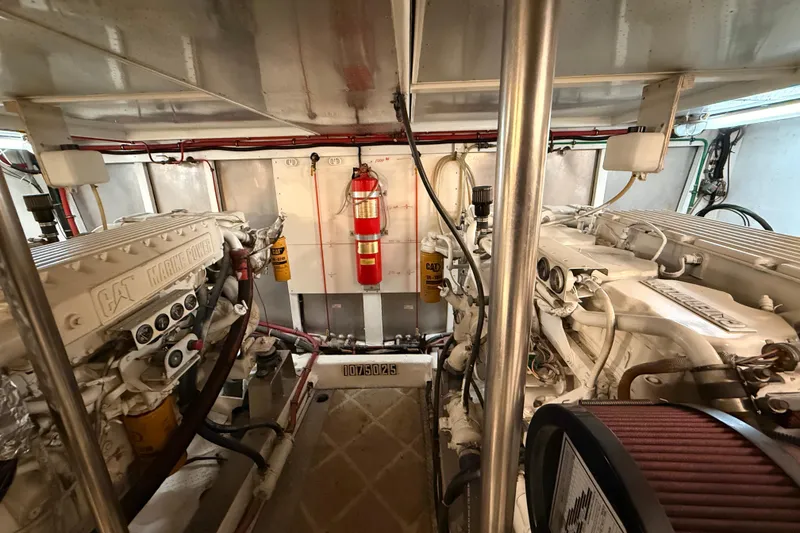 Slide: The Image of 1998 Ocean Alexander Pilothouse Model 584 interior with CAT Marine Power equipment. - 61