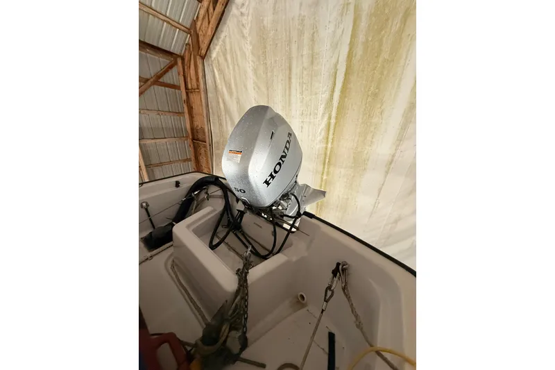 Slide: The Image of 1998 Ocean Alexander Pilothouse Model 584 in a wooden boathouse, interior view. - 67