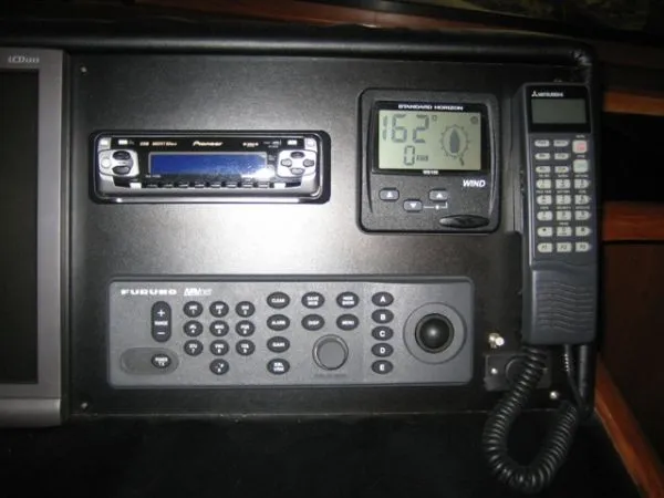 Slide: The Image of 1998 Ocean Alexander Pilothouse Model 584 yacht in a wooden boathouse. - 16