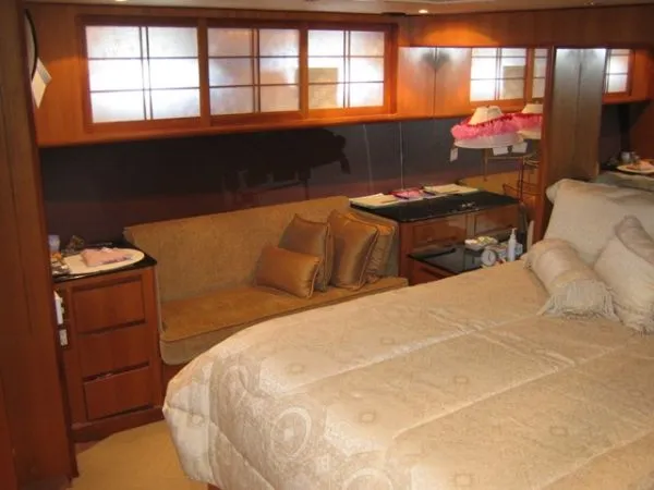 Slide: The Image of 1998 Ocean Alexander Pilothouse Model 584 yacht in a wooden boathouse. - 18