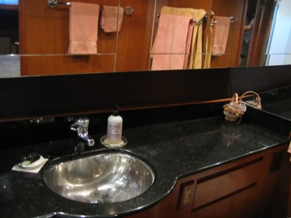 Slide: The Image of 1998 Ocean Alexander Pilothouse Model 584 yacht in a wooden boathouse. - 20