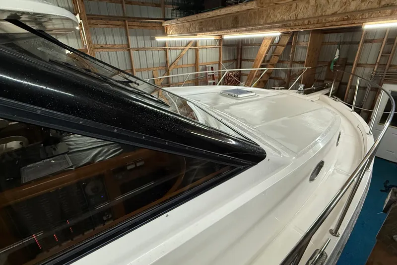 Slide: The Image of 1998 Ocean Alexander Pilothouse Model 584, teak deck, spacious cockpit, white interior walls. - 31