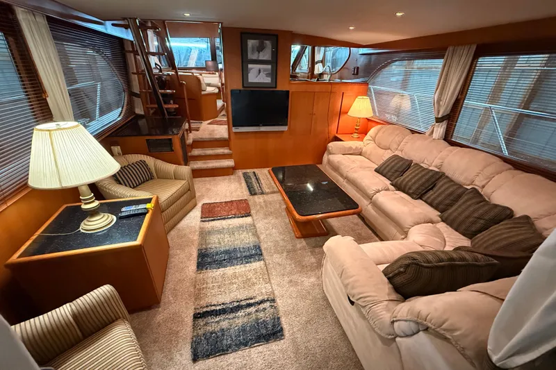 Slide: The Image of Luxurious 1998 Ocean Alexander Pilothouse Model 584 interior with plush seating and elegant decor. - 35