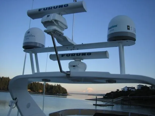 Slide: The Image of 1998 Ocean Alexander Pilothouse Model 584 interior with navigation controls and seating area. - 4