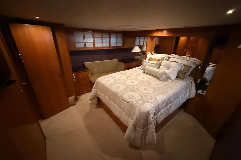 Slide: The Image of Luxurious bedroom interior of 1998 Ocean Alexander Pilothouse Model 584 yacht. - 44