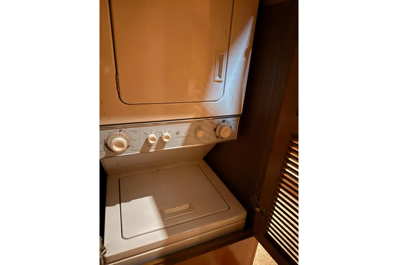 Slide: The Image of Cozy twin cabin in 1998 Ocean Alexander Pilothouse Model 584 yacht, featuring plaid bedding. - 50