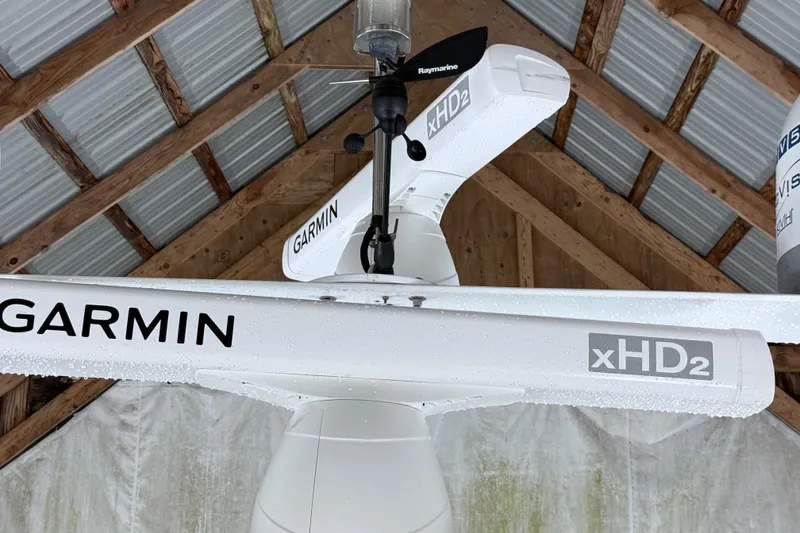 Slide: The Image of 1998 Ocean Alexander Pilothouse Model 584 control panel and stairs in a boat interior. - 72