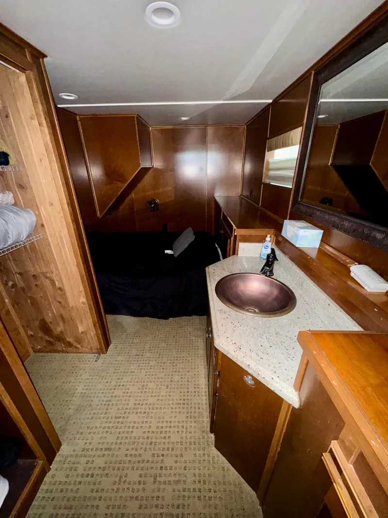 Slide: The Image of Bronze sink with black faucet on speckled countertop, Bravada Dreamweaver Share #2, 2011 model. - 9