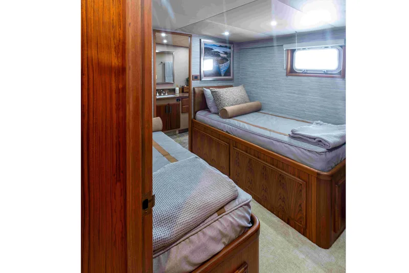 Slide: The Image of Luxurious 1972 DITTMAR & DONALDSON motoryacht cabin with twin beds and elegant wood finish. - 12