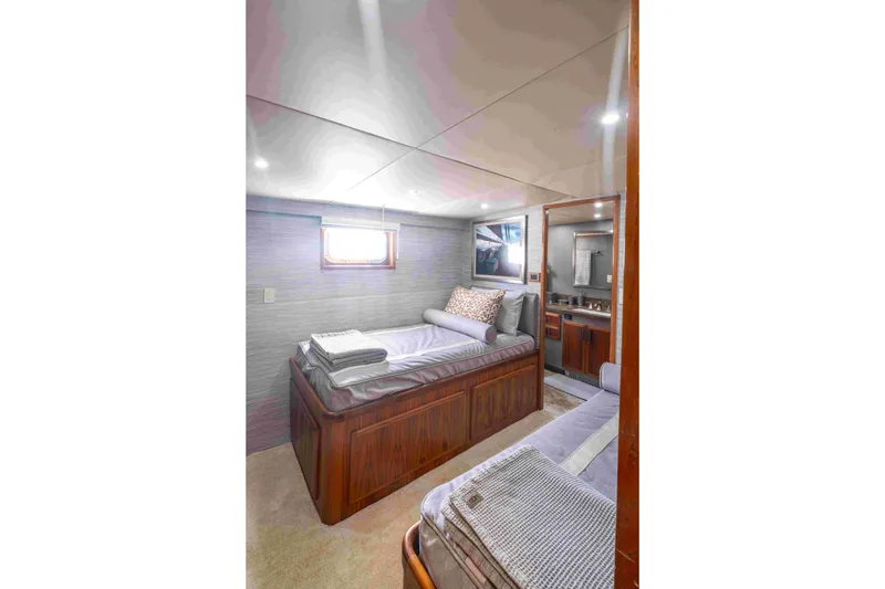 Slide: The Image of Luxurious 1972 DITTMAR & DONALDSON motoryacht cabin with twin beds and elegant decor. - 14