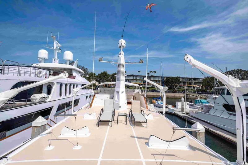 Slide: The Image of 1972 DITTMAR & DONALDSON Motoryacht docked, featuring spacious deck and modern equipment. - 18