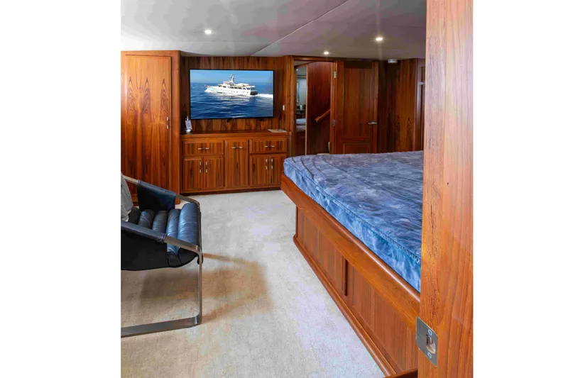 Slide: The Image of Luxurious 1972 DITTMAR & DONALDSON motoryacht interior with wood paneling and modern amenities. - 8