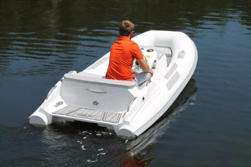 Slide: The Image of 2018 Ribjet 10 Jet Yacht Tender on water, rear view. - 10