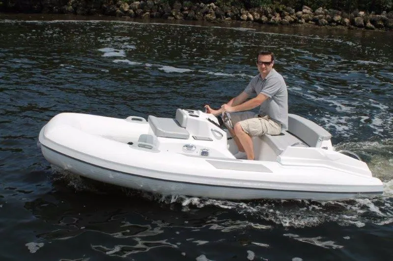 Slide: The Image of 2018 Ribjet 10 Jet Yacht Tender on water with driver. - 20