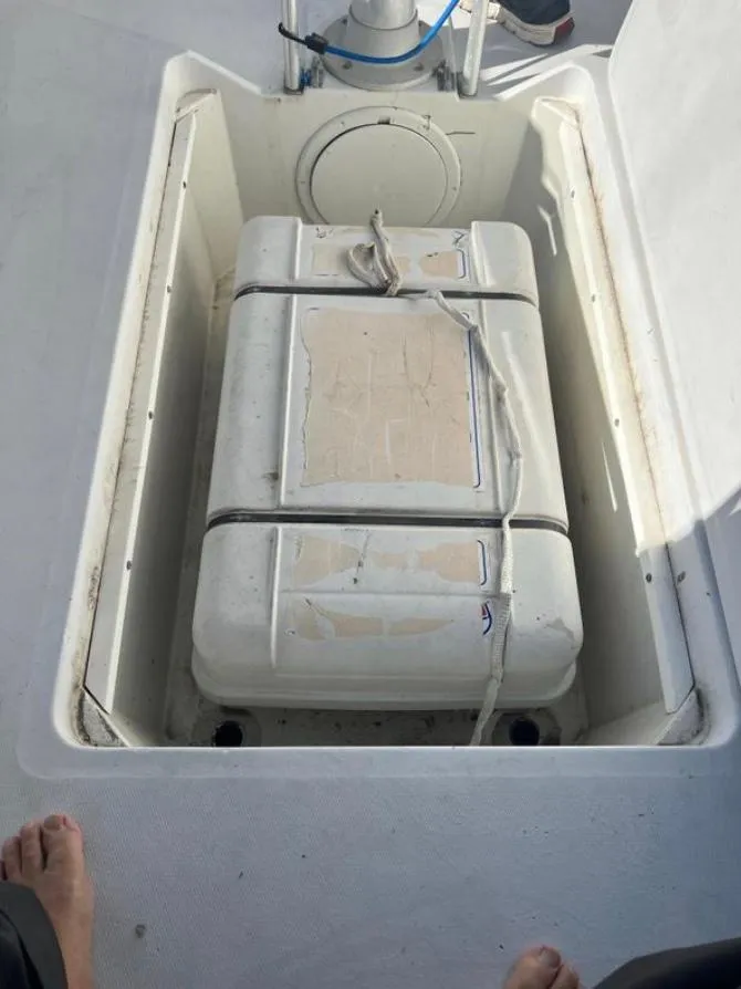 Slide: The Image of Storage compartment on 1985 Gib'Sea 126 sailboat with secured equipment. - 20