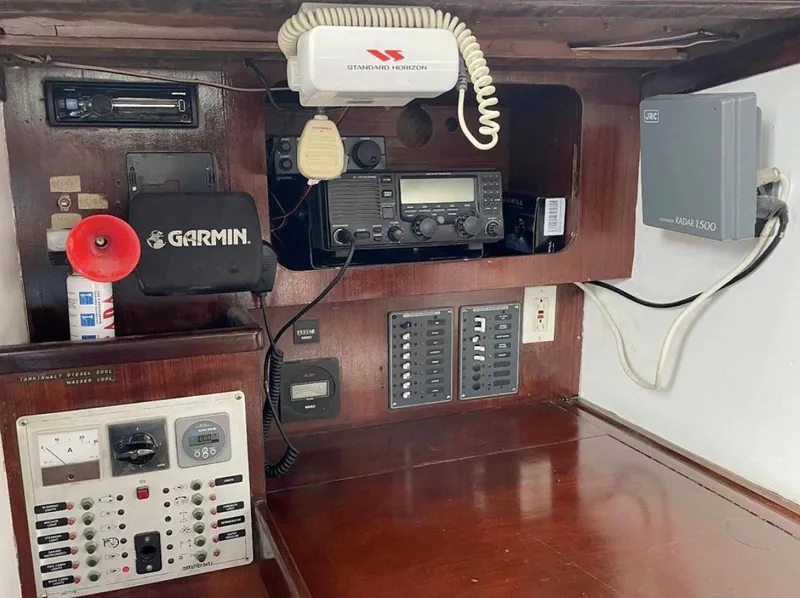 Slide: The Image of Control panel of a 1985 Gib'Sea 126 yacht with navigation and communication equipment. - 39