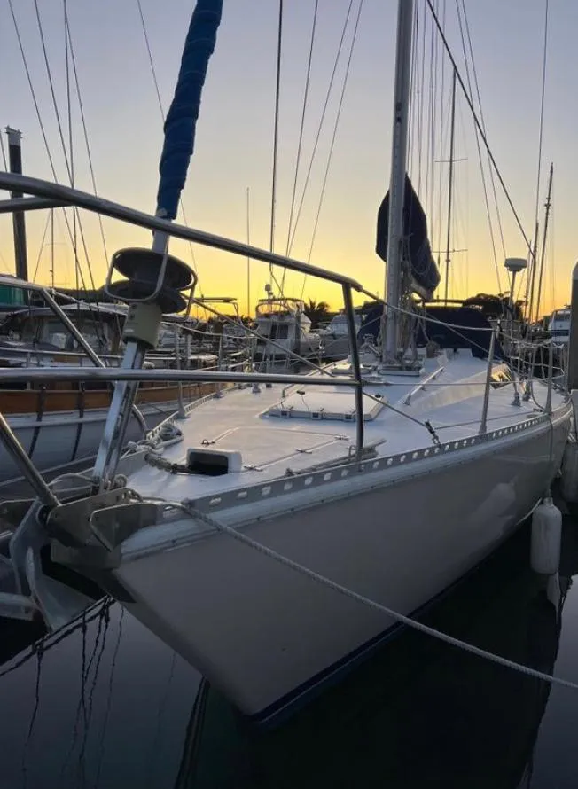 Slide: The Image of 1985 Gib'Sea 126 sailboat docked at sunset in a marina. - 6