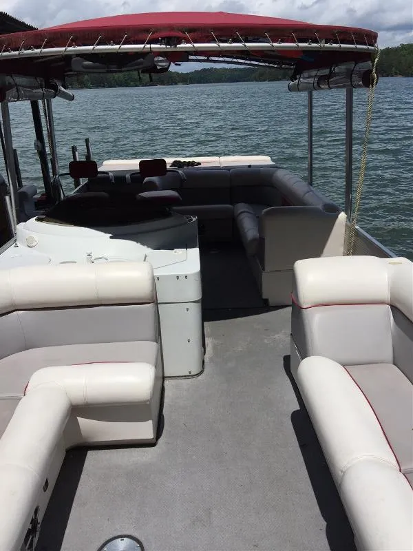 The Image of 2002 Harris-Kayot Royal Heritage 260 pontoon boat interior with seating and canopy. - 1