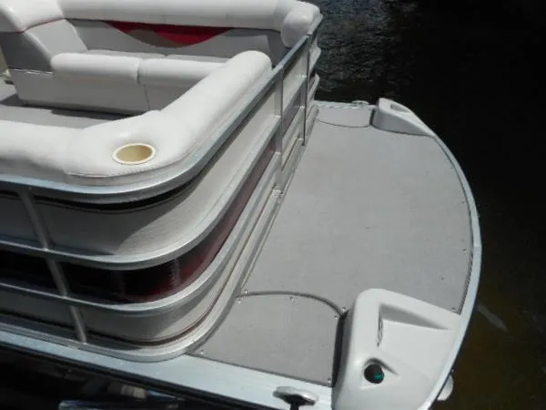 Slide: The Image of 2002 Harris-Kayot Royal Heritage 260 pontoon boat, rear deck view with seating and cup holder. - 3